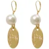 Desginer Viviene Westwoods Empress Dowager Vivian Ellipse avec diamant Saturn Pearl Boucles d'oreilles pour femme avec haute sensibilité et longues boucles d'oreilles personnalisées en forme de pièce d'or