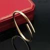 Pulsera de diamantes de oro Diseñador de joyas de uñas para mujeres Hombres Brazalete Todos los diamantes Joyas de acero inoxidable No alérgico Pulseras de uñas de color rápido REB7 M9Y3 M9Y3