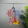 Diseñador de hombres Camisas de alta calidad Camisas casuales de manga corta de verano Moda Polos sueltos Estilo de playa Camisetas transpirables Camisetas Ropa Tamaño M-3XL