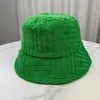 Cappelli a secchiello Nuovo cappello a secchiello per asciugamano da donna/uomo Cappello da sole a righe monocromatiche casual 231104