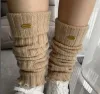 Calcetines de lana de diseñador de lujo Moda Mujer Invierno Cálido Calentador de piernas Hasta la rodilla Lana de punto Calentadores de ganchillo Legging Bota de lana Slouch para niñas