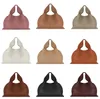 Ny design French Light Luxury Women Cloud Bag Läder Messenger Portable Women's Bag Dumpling Bag