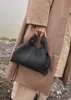 Ny design French Light Luxury Women Cloud Bag Läder Messenger Portable Women's Bag Dumpling Bag