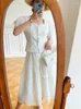 Arbetsklänningar Fairy Summer White 2 Pieces Set Women Retro Square Neck A-Line Long Kjol Duits Celebrity Style Elegant Lace Beach Outfits