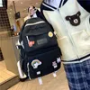 バックパック女性学生カワイイ防水ナイロンスクールバッグガールファッションバックルラップトップ女性本女性贅沢56