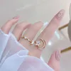 Cluster Rings Super A 14k Real Gold Star och Moon Hollow Unique Design Rotertable Ring Ladies Pearl Open High End Banket Girl Gift Jewelry