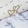 Kolczyki stadnorskie słodkie urocze imitacja w kształcie serca perła dla kobiet modna miłość koreańska urok kolczyka biżuteria prezenty na przyjęcie weselne