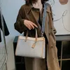 2024SS Bolsos de mano de lujo Bolsos de compras de alta calidad Bolsos de mujer Moda los bolsos de mano Bolso de diseñador de cuero genuino 2 unids / set Bolsa onthego bag