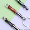 New Fashion Car Shock Absorber Keychain for Car Lovers Creative Unisex Car Bag Metal Spring Keyrings Pendant Gifts