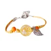 Bracelet Chakras de style bohémien, multicolore, réglable, tressé à la main, avec perle de verre en céramique, fleur sèche