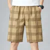 Men's Shorts 2023 Men's Summer Cotton Shorts Fashion Plaid Stripe Casual Breeches Male Elastic Force Aletic Cargo Shorts Loose Beach Pants Z0404