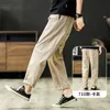 Calça masculina esportes de primavera e algodão de algodão da versão coreana das ferramentas de tendência solta cor sólida e reta Nove