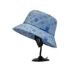 バケツの帽子新しいファッションユニセックスグラフィティプリントバケツ帽子夏のメンズアウトドアビーチトラベルスポーツレジャーハット高品質のアダルトサンハット231104