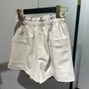 Femmes Shorts Femmes Vêtements Mode Feminino En Cuir Véritable Blanc Casual Mujer Grandes Poches Taille Élastique Sexy Mini Booty Pantalon 230403