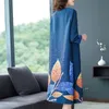 Robes décontractées Robe féminine plissée 2023 Section d'impression à manches longues printemps Une jupe de mot Europe