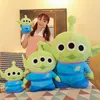 Nouveaux produits en gros de dessin animé jouets en peluche 3 yeux poupée mignonne compagnon de jeu pour enfants dormir oreiller cadeau de vacances affichage de fenêtre