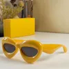 Modne damskie designerskie okulary przeciwsłoneczne dla kobiet mężczyzn styl hip-hopowy osobowość zabawa awangardowe okulary z pudełkiem 40097