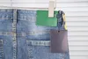 Jeans da uomo impilati da uomo stampati ricami jacquard con foro dritto lavaggio patchwork irregolare patch ricamo tessuto Strch alto