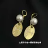 Desginer Viviene Westwoods Empress Dowager Vivian Ellipse with Diamond Saturn Pearl earrings High SenseとPersonalized Long Gold Corin erringsの女性