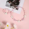 Chaînes Bijoux pour enfants Bracelet de bande dessinée Collier Ensemble en bois extensible perlé 50 cm Animaux sûrs et Kawaii pour les enfants