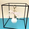 Sleutelhangers Mode Leuke Kant Boog Faux Bal Pom Sleutelhanger Huwelijkscadeau Vrouwen Tas Sleutelhanger Keten Mannen Auto Sleutelhanger Meisje party Trinket