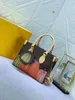 Designer bags The multistep printing process of handbags is in and the canvas surface is copied symbolic colorful spots Removable zero wallet with additional functi