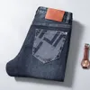 Jeans pour hommes Designer Designer classique jeans pour hommes vaqueros ariat mode denim bleu pantalon slim stretcasual ZQO2