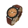 Montres-bracelets Simulation de vente de produits Quartz en bois Femme Loisirs Couleur Bracelet en cuir Montres fabriquées par l'hommeMontres-bracelets
