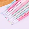 10pcs/caixa conjunto caneta de gel fofa para crianças estudantes estudantes material de escritórios da escola papelaria Kawaii escrevendo canetas de 0,5 mm de tinta colorida