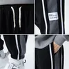 سراويل الرجال السراويل غير الرسمية للرجال رجال ضجة كبيرة الحجم واسعة الساق سراويل مرنة الخصر streetwear أزياء الأزياء harajuku رجال السراويل 5XL 230404