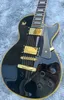 Custom electric guitar, black casting, yellow logo and body binding, gold accessories, lightning bag