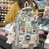 Schultaschen Mädchen Hohe Kapazität Nylon Drucktasche Damen Niedliche Cartoon-Muster Laptop Mode Weibliche Reise College Rucksack Frauen