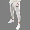 Herenbroekbroeken mannen joggt joggrode streetwear broek mode bedrukte spiersportheren broek 20CK23 230404