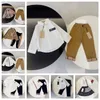 Children's designer spring and autumn new long-sleeved shirt with trousers set letter embroidery check lapel casual fashion children's two-piece set F010