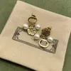 Créateurs de bijoux à la mode Boucles d'oreilles pendantes de luxe en argent plaqué Boucles d'oreilles pour femmes Boucles d'oreilles classiques en or avec lettre