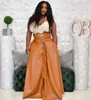 QNPQYX NIEUWE Women Dress High Taille Faux Leather Long Skirts Night Club Street Vintage Sashes A-Line Maxi Pu Srokken Party Bandage Rok
