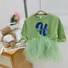Fille robes enfants vêtements 2023 à la mode printemps automne à capuche Patchwork gaze jupe lettre imprimé bébé décontracté Simple robe