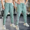 Pontas de corrida Mens Gym Fitness Running Sweatout Workout Athletic Long Pants Training Outdoor Sports Strousers Calça de cintura elástica zíper 230404