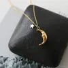 Wisiorki Tytanium z 18 K Gold Moon Star Charms Naszyjnik Kobiety Projektant biżuterii ze stali nierdzewnej T Show suknia wybiegu rzadka gotycka Japonia