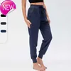 LU-01 Women Yoga Ninth Pants Running Fitness Joggers z kieszenią na zamek błyskawiczny Elastyczne jogging 4 kolory D2023SS