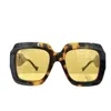 Neue Designer -Sonnenbrille Top -Designer modische großzügige Rahmen Tide Hohlaustempel Mode