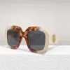 Neue Designer -Sonnenbrille Top -Designer modische großzügige Rahmen Tide Hohlaustempel Mode