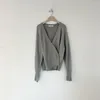 Pulls pour femmes coréen chic automne / hiver unique épaule diagonale bouton col en v pull femme minorité conception tricoté cardigan manteau