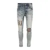 Jeans skinny strappati strappati da uomo Designer Fashion Moto Pantaloni lunghi in cotone slim Piedi High Street Denim Azzurro Incolla Pantaloni con buco in tessuto Hip Hop Uomo Viola EUMH