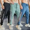 Running Pants Mens Gym Fitness Running Sweatpants Workout Athletic Long Pants Outdoor Training Sports Trousers Elastic midjextlåsfickor 230404