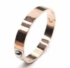 Designer smycken Bangle Rose Gold Silver Silver Rostfritt stål Kvinnor Armband Enkelt korsmönster Spänne Kärleksmycken