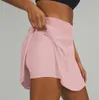 Gonne da tennis Gonne da tennis sportive a vita alta da donna 2 in 1 Fitness Golf Badminton Running Pantaloncini sportivi con mini pantaloni a pieghe tascabili 230404