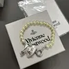 VivianeネックレスデザイナーViviennes Westwoods Jewelry 23 New Love Pin Pearl Bracelet Women's Light Luxury Ins Sweet Cool Heart Saturn Handicraft