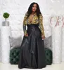QNPQYX NIEUWE Women Dress High Taille Faux Leather Long Skirts Night Club Street Vintage Sashes A-Line Maxi Pu Srokken Party Bandage Rok