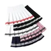Tennis kjolar veckade tennis kjol kvinnor atletisk golf kjol sport kläder träning som kör mini kjolar koreansk stil sexig kjol harajuku kjol 230404